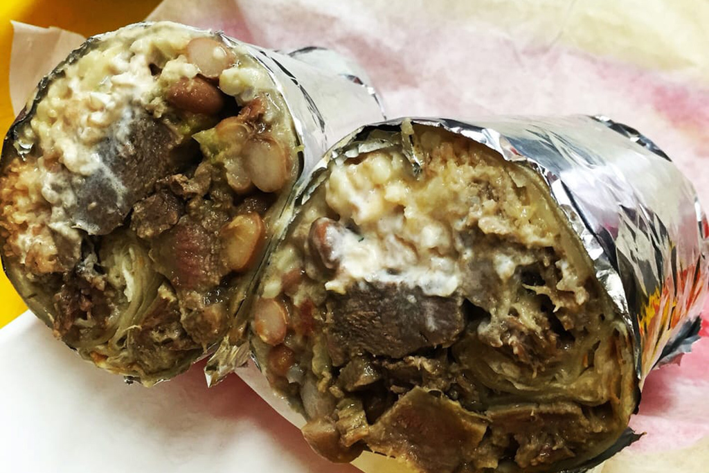 El Farolito signature dishes Super Burrito LenguaCarne Asada BurritoChips and SalsaChicken Burrito